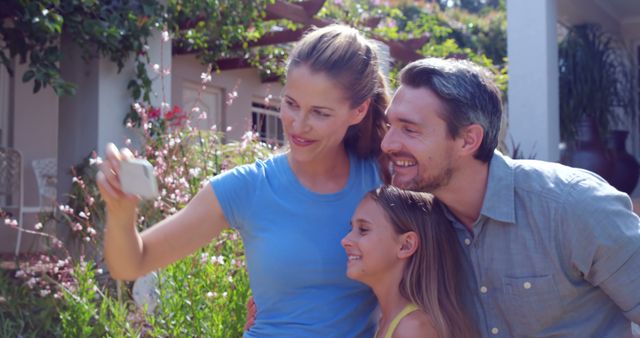 Happy Family Taking Selfie Outdoors in Garden - Download Free Stock Images Pikwizard.com
