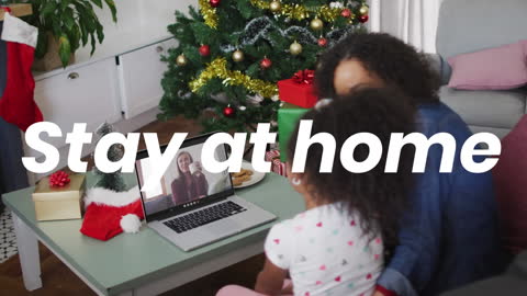 Mother and Daughter Video Calling Family During Holidays at Home