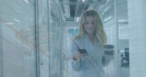 Businesswoman Analyzing Data on Smartphone in Office