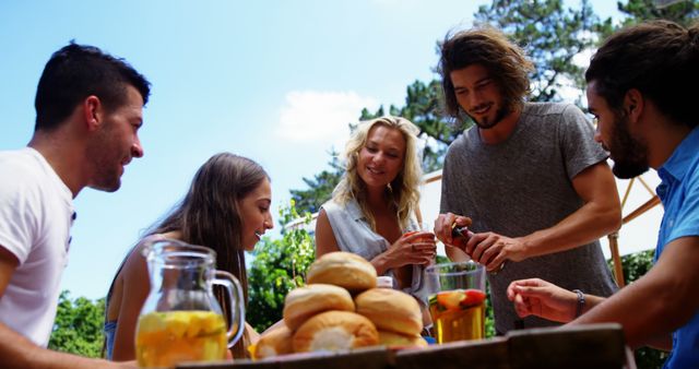 Friends Enjoying Outdoor Barbecue Near Pool on Sunny Day - Download Free Stock Images Pikwizard.com