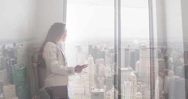 Businesswoman Overlooking City Skyline with Double Exposure Effect - Download Free Stock Images Pikwizard.com