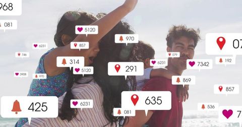 Family enjoying beach day while social media notifications overlay seaside portrait