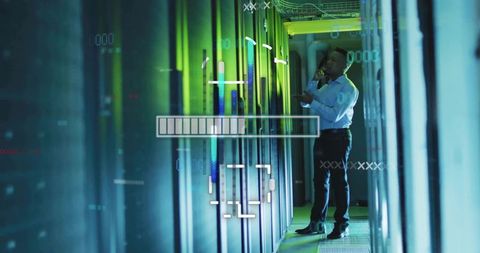 IT Technician Inspecting Server Racks in Data Center with HUD Overlay and Monitoring