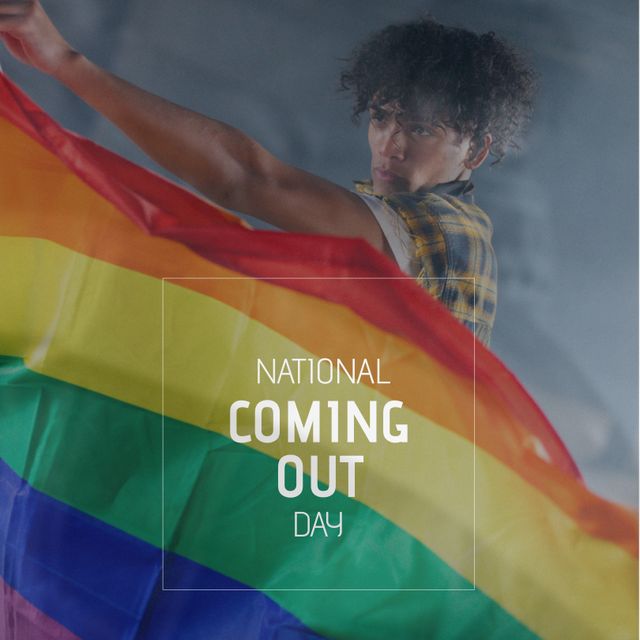 Confident Young Biracial Man Celebrating National Coming Out Day with Rainbow Flag - Download Free Stock Templates Pikwizard.com