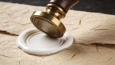 Brass Wax Seal Stamp Pressing White Wax on Handmade Paper for Vintage Document