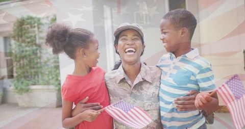 Joyful Reunion of Female Soldier and Her Children with American Flags - Download Free Stock Images Pikwizard.com