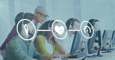 Diverse Team Collaborating in Modern Tech Office with Media Icons