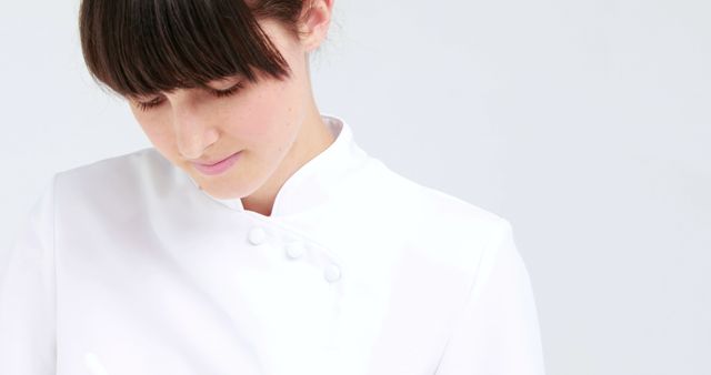 Female Chef in White Uniform Focusing While Cooking - Download Free Stock Images Pikwizard.com