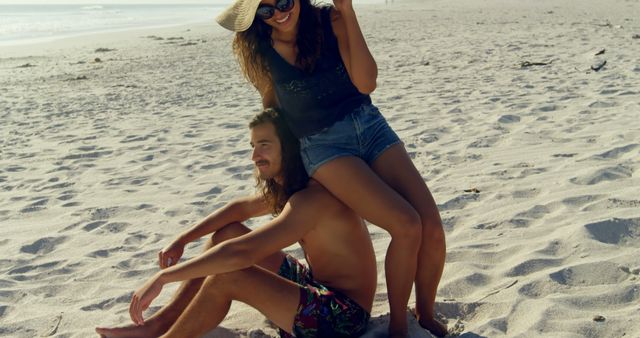 Happy Young Couple Enjoying Summer Beach Vacation - Download Free Stock Images Pikwizard.com