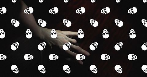 Horror Skulls Floating Over Mysterious Hand in Dark Space - Download Free Stock Images Pikwizard.com