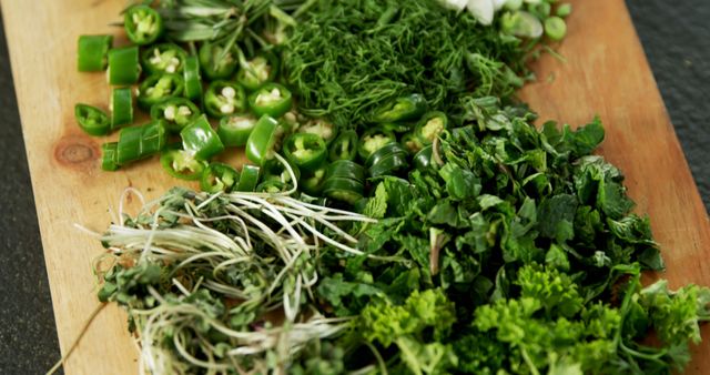 Freshly Chopped Herbs and Vegetables on Wooden Board - Download Free Stock Images Pikwizard.com