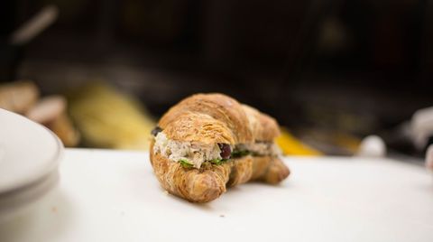 Delicious croissant sandwich with tuna salad filling