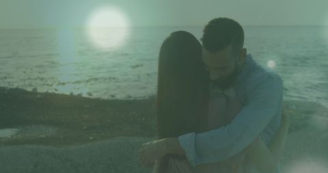 Couple Embracing at Beach During Sunset - Download Free Stock Images Pikwizard.com