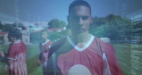 Soccer Player in Jersey Merging with Digital Code Overlay Outdoors