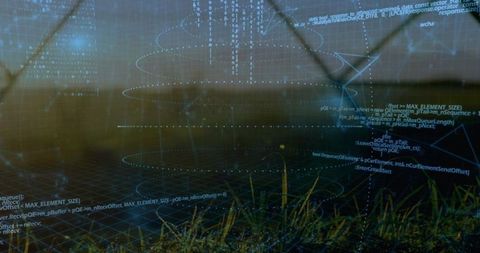 Augmented reality data overlay hovering above grassy field at dusk with wireframe rings