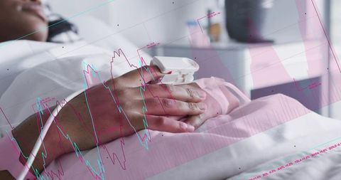 Resting patient monitored with pulse oximeter and iv line, clinical data overlays