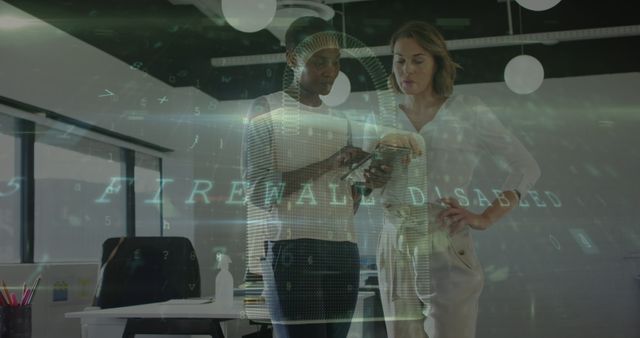 Businesswomen Analyzing Digital Data with Holographic Firewall Warning - Download Free Stock Images Pikwizard.com