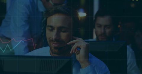 Trader Analyzing Market Data with Headset in Modern Office