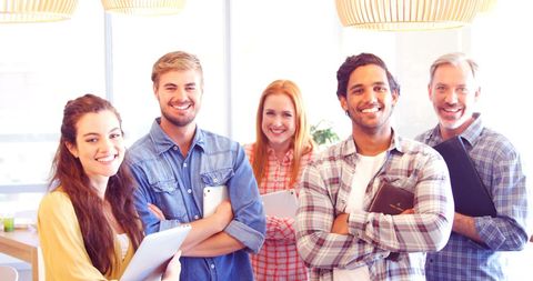 Diverse Professional Team Smiling with Confidence in Bright Office - Download Free Stock Images Pikwizard.com