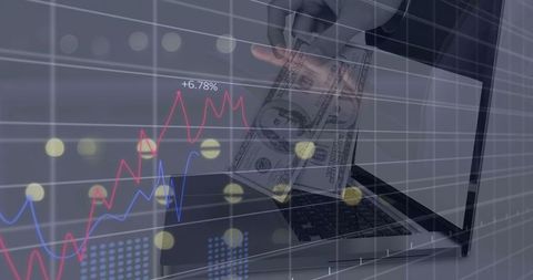 Person handling dollars with laptop and stock market charts