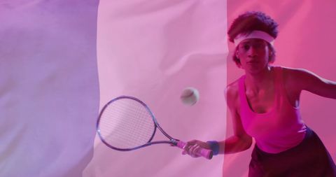 Courageous player with french flag in tennis stadium