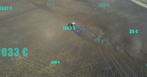 Aerial tractor plowing field with teal telemetry overlays, tillage dust plume, precision farming