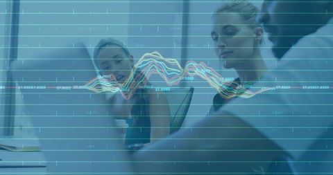 Business Team Analyzing Data Charts on Digital Screen in Meeting Room