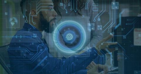 collaborating developers analyzing digital interfaces with futuristic overlays - Download Free Stock Images Pikwizard.com