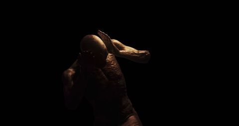 Distressed Figure in Darkness Expressing Fear and Pain - Download Free Stock Images Pikwizard.com