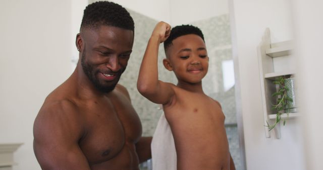 Happy Shirtless African-American Father and Son in Bathroom - Download Free Stock Images Pikwizard.com