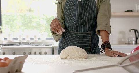 Young Woman Kneading Dough in Modern Kitchen - Download Free Stock Images Pikwizard.com