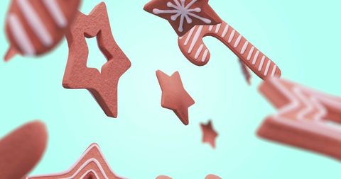 Festive gingerbread cookies floating on aqua background