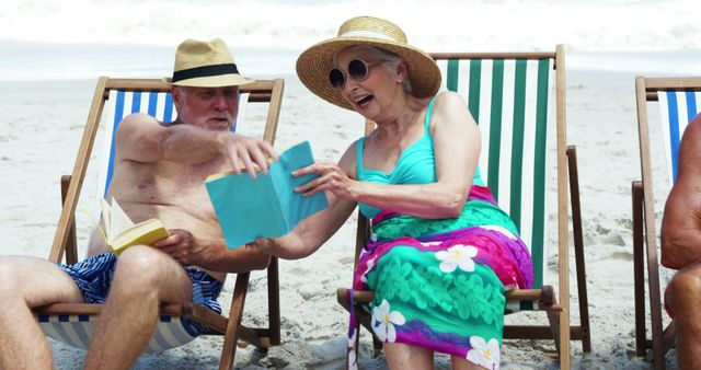 Elderly Couple Relaxing on Beach Loungers Reading Books - Download Free Stock Images Pikwizard.com