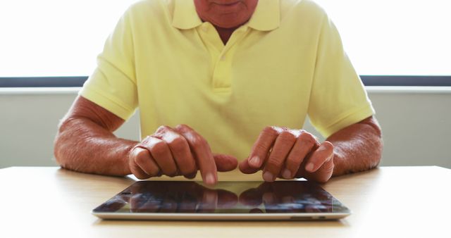 Senior Man Using Tablet for Communication at Home - Download Free Stock Images Pikwizard.com