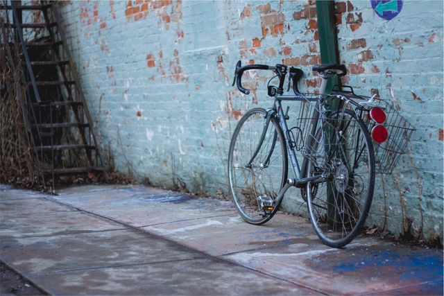 Vintage Bicycle Leaning Against Weathered Brick Wall - Download Free Stock Photos Pikwizard.com