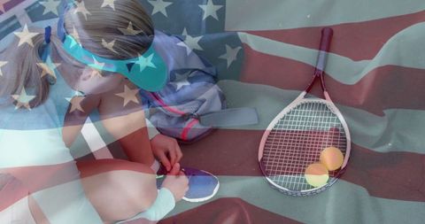 Young Tennis Player Tying Shoelaces with American Flag Overlay