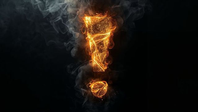 Fiery exclamation mark with ember trails and cinematic smoke, dramatic punctuation symbol