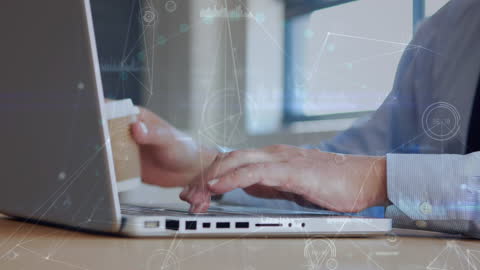 Businessman Using Laptop with Futuristic Network Overlay