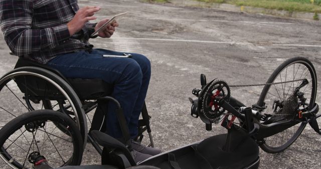 Man Using Handcycle and Wheelchair Outdoors - Download Free Stock Images Pikwizard.com