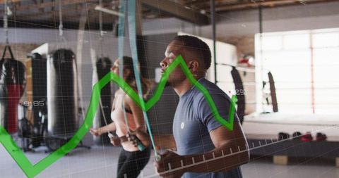 Jumping rope cardio training with green analytics overlay tracking metrics in boxing gym