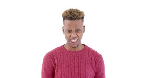 Confident young adult showing serious facial expression