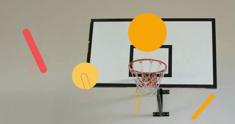 Minimalist basketball hoop with graphic circles and colorful abstract shapes on wall