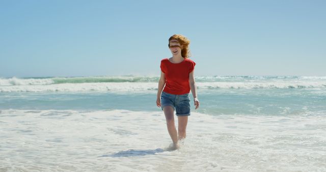 Happy Woman Enjoying a Sunny Day at the Beach - Download Free Stock Images Pikwizard.com