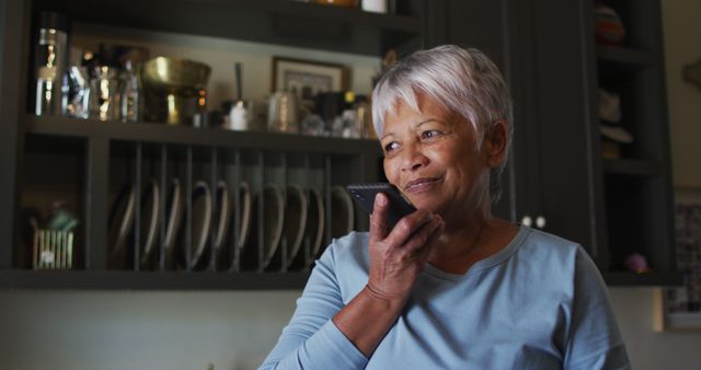 Senior Woman Smiling While Using Voice Command on Smartphone - Download Free Stock Images Pikwizard.com