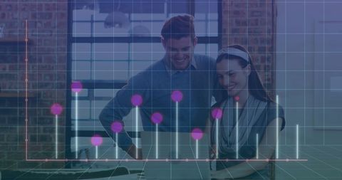 Business Professionals Analyzing Graph on Laptop in Office