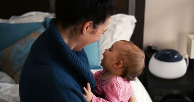 Mother and Baby Bonding Together in Bedroom - Download Free Stock Images Pikwizard.com