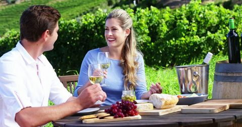 Romantic Picnic in Lush Vineyard Enjoying Wine Together - Download Free Stock Images Pikwizard.com