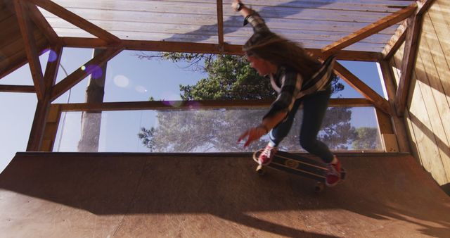 Image of caucasian female skateboarder in skate park. Skateboarding, sport and hobby concept digitally generated image.