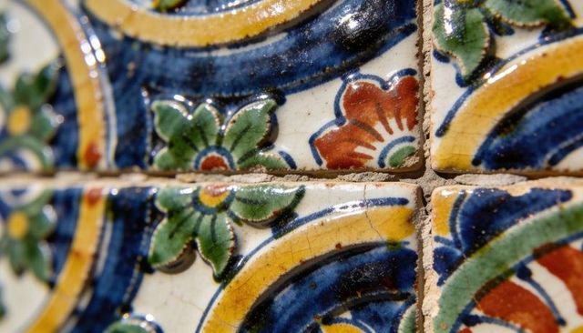 Close-up featuring glazed ceramic tiles with crackle glaze and hand-painted floral motifs