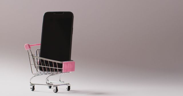 Smartphone in shopping trolley on seamless grey background. Global business, online shopping, cyber monday, sale and retail concept digitally generated image.